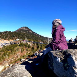 Adventure.Toes – A Hiker Enjoys the View at a Lookout Point