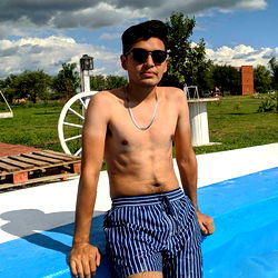 Gaby Peraless, a Young Model from Argentina Posing in a Swimsuit