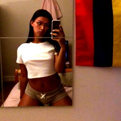 Angel, OnlyFans Model in Athletic Wear Taking Selfie