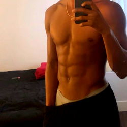 Muscular OnlyFans Model in Gym Gear Posing