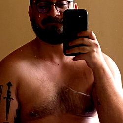 Happy-Go-Lucky Man with Tattoos Sharing His Selfie Moment!