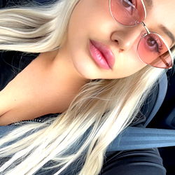 Fashionable Female Model in a Car