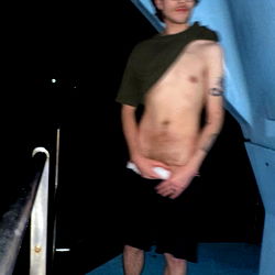 An Onlyfans Model Posed in Front of a Boat Dock