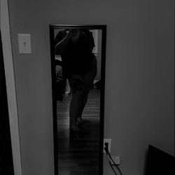 Angel's Minimalist Mirror Setup in Rustic Room