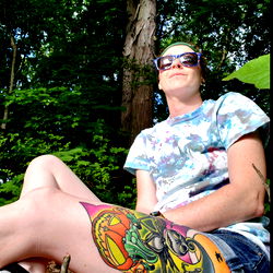 Tattooed Woman in Outdoor Setting