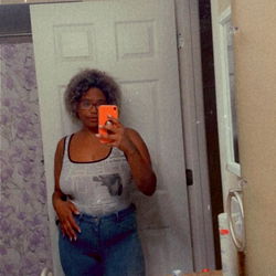 A Stylish Afrolatina Model in Bathroom