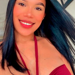 A Smiling Model in a Red Bikini