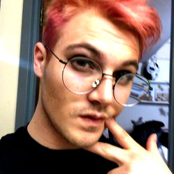 Stylish Young Man with a Playful Expression