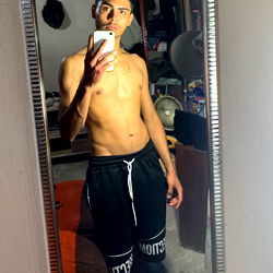 Fashionable Fitness Model in Gym Mirror