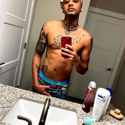 Young Man in Bathrobe, Tattoos and Red Sunglasses, Taking Selfie
