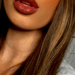 OnlyFans Model Showcasing Her Long Hair and Pink Lipstick