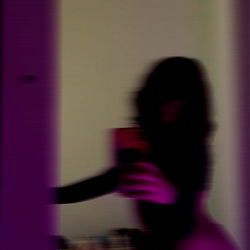 Sensual Photography of OnlyFans Model in Vivid Pink Room