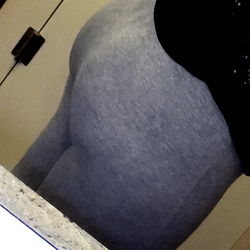 Onlyfans Model in Grey Tights, Showing Rear View