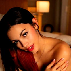 Eva Fox in Elegant Lingerie on Bed