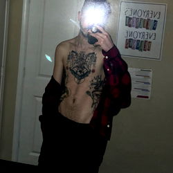 Onlyfans model Duke Hung captures his shirtless look in a selfie,