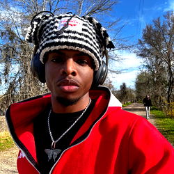 Urban Male Model with Headphones and Ear Muffs