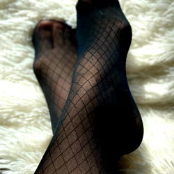 Intimate Apparel: LilPod Showcases Transparent Fishnet Socks and Ridged Corset