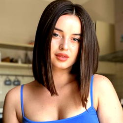 Maria, A Stylish Short Hair Model Smiling at the Camera