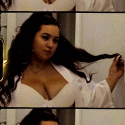 OnlyFans Model C.R.E.A.M in a White Bathrobe and Lingerie