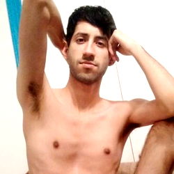 Adam - Shirtless, Leaning on Arm in Playful Mood