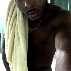 Chulo, a model from OnlyFans, captured in a selfie with a towel