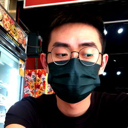 Leo, 23 - A Modern Asian Teenager in a Café