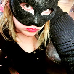 Playful Feline Masked Woman