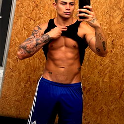 Fitness Model Enzo Oliveira in Rooftop Gym