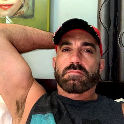 Celebrity Fitness Trainer Resting in Bed