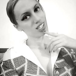 Model Anastasia Angela in a Plaid Blazer