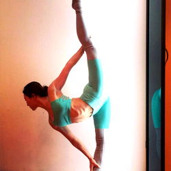 Chinese Ballerina Striking a Pose in Hong Kong Gym