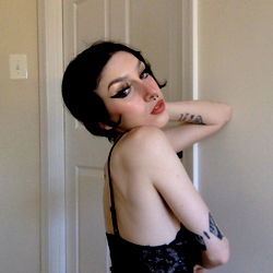 Adri, a Model with Striking Short Hair and Tattoos