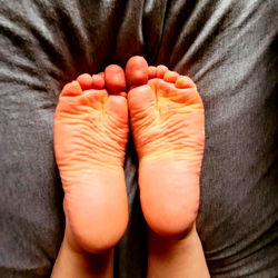 Elle's Relaxing Pose with Feet Up