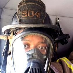 A Firefighter in Protective Gear