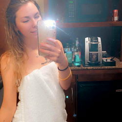 Onlyfans Gracey10 posing in a robe