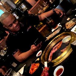 A Man Enjoying a Meal at a Restaurant