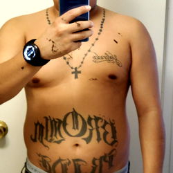 Elnumero1's Tattooed Shirtless Body