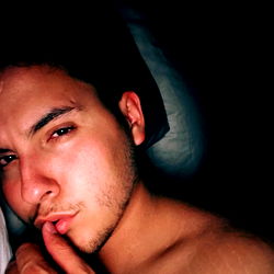 Sleepy Nighttime Photograph of Tito, a 25-Year-Old Male