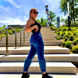 Allie Powell, a Young Model in an Urban Park