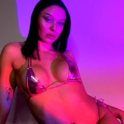 OnlyFans Model in Stylish Swimsuit