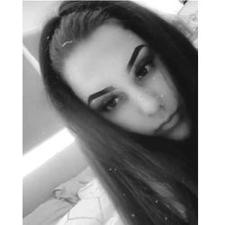 A Young Australian Woman with Striking Features and Makeup