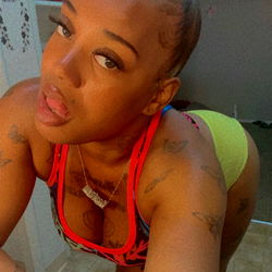 The  chosen One poses for an OnlyFans photo