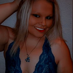 AllyKat, OnlyFans Model in a Blue Dress