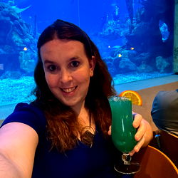 Erica enjoying a cocktail at the aquarium