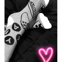 Tattyfeets' Feet in Sock-Matching Bedding