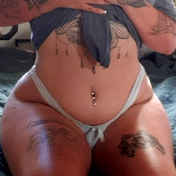 Netia Delaney, an OnlyFans Model, Posing in a Seductive Lingerie Photo