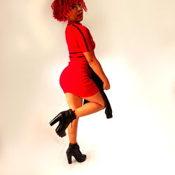 Red-haired model in a short dress