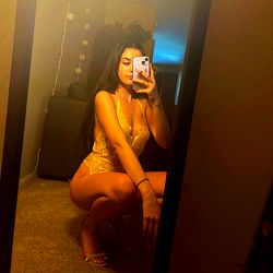 Goddess Ash: OnlyFans Model Posing in Yellow Gown