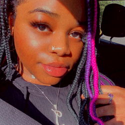 Fashionable OnlyFans Model Goldielicious in Colorful Braids