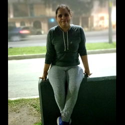 Aime From Mexico - Young Woman in Grey Sweatshirt